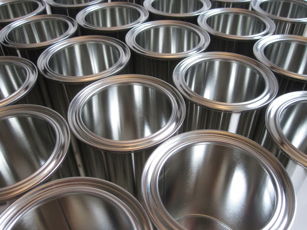 Rows of formed bright steel cylinders with clean rolled edges
